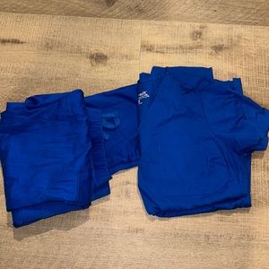Never worn, royal blue scrubs. Butter soft.